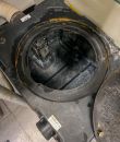 Waste tank with labels inlet outlet and dirt inside